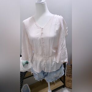 Worn once cream top size large